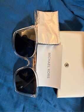 Michael Kors clear frames, gold arms. These are prescription readers